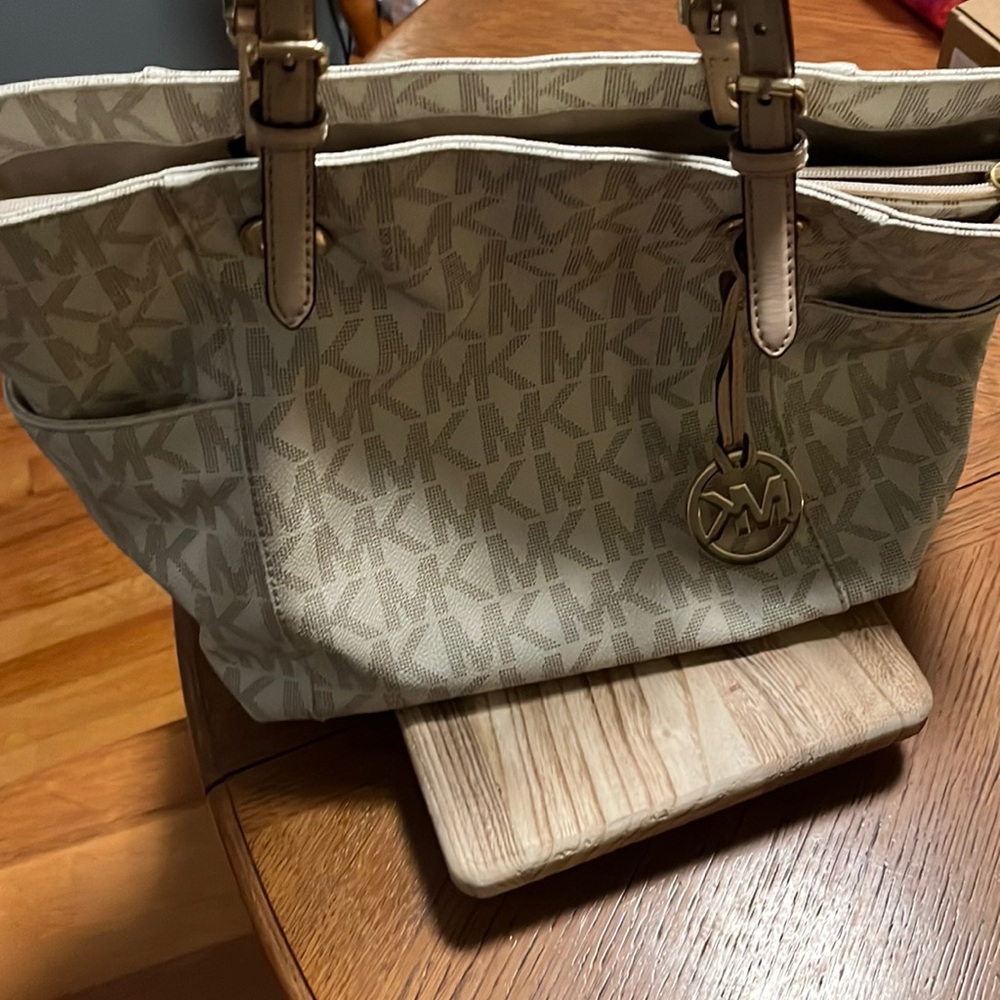 Michael Kors tote bag/purse with makeup/accessory pouch.